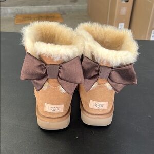 UGG women’s ' Brown Boots with Bow